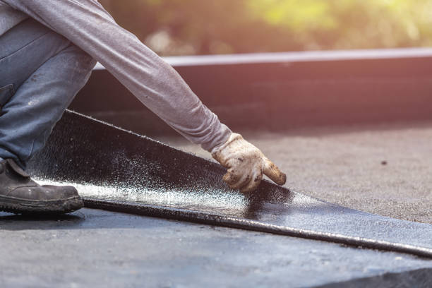 Professional Emergency Waterproofing technician working in Holt, MI